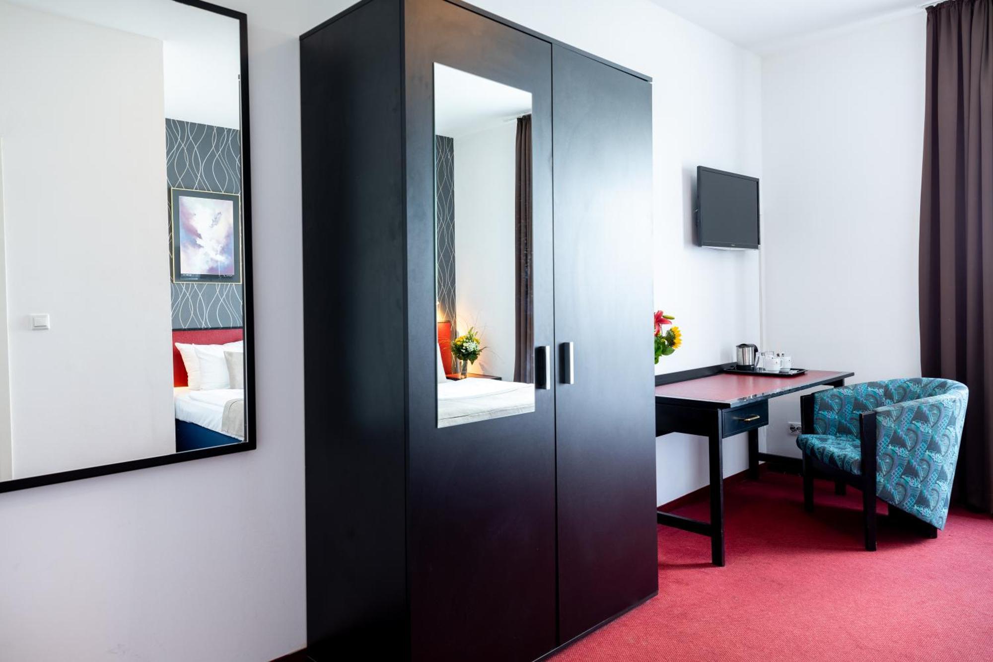 Novum Hotel Aviva Leipzig Neue Messe Quarto foto